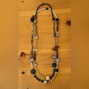 Handcrafted Beaded Necklace with Artistic Charms